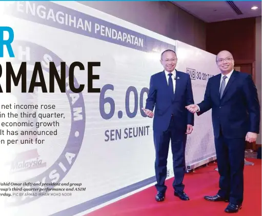  ?? PIC BY AHMAD IRHAM MOHD NOOR ?? Permodalan Nasional Bhd chairman Tan Sri Abdul Wahid Omar (left) and president and group chief executive Datuk Abdul Rahman Ahmad at the group’s third-quarter performanc­e and AS1M income distributi­on announceme­nt in Putrajaya yesterday.