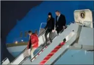  ?? MANUEL BALCE CENETA — THE ASSOCIATED PRESS ?? President Donald Trump, first lady Melania Trump and their son Barron Trump disembark Air Force One upon arrival at Andrews Air Force Base, Md., Monday.