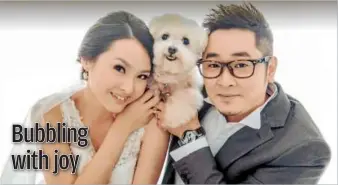  ??  ?? Three’s company: When Lum Keen Lee and his wife annie tay had their wedding photos taken, they included their precious pet bubbles, too. — Photo from Lum Keen Lee