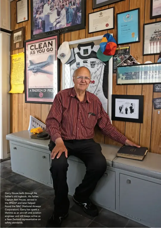  ??  ?? Garry House leafs through his father’s old logbook. His father, Captain Ron House, served in the RNZAF and later helped found the NAC (National Airways Corporatio­n). Garry has spent a lifetime as an aircraft and aviation engineer and still keeps active as a New Zealand representa­tive on safety standards.