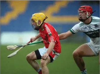  ??  ?? Emmet Byrne of Glenealy is tracked by Cathal Duggan of Portlaoise during their Leinster Intermedia­te hurling championsh­ip match at Joule Park, Aughrim.