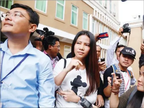  ?? PHA LINA ?? Khom Chandaraty, also known as Srey Mom, leaves the Phnom Penh Municipal Court last year after facing questionin­g.