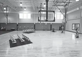  ?? BRETZGER/DELAWARE NEWS JOURNAL PHOTOS BY WILLIAM ?? The basketball court and multipurpo­se gymnasium in Freire Charter Wilmington’s new athletic center has been in use for weeks, including for the Midtown Brandywine school’s boys’ varsity basketball team. It was celebrated in ceremony Wednesday. The school had been without a dedicated gymnasium for athletics and physical education since it opened in 2015.