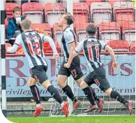  ??  ?? The Pars’ Joe Thompson celebrates his goal