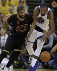  ?? MARCIO JOSE SANCHEZ — THE ASSOCIATED PRESS ?? Kyrie Irving tries to take the ball from the Warriors’ Kevin Durant during the second half of Game 2 of the NBA Finals in Oakland, Calif. on June 4.