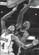  ?? WALLY SKALIJ/TRIBUNE NEWS SERVICE ?? San Antonio Spurs' Dewayne Dedmon dunks over Los Angeles Lakers' Brandon Ingram in 2017 at the Staples Center in Los Angeles.