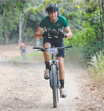  ??  ?? THUMBS UP: Gordon Milne rode more than 50km in the inter-school mountain bike competitio­n.