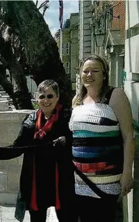  ??  ?? ●●Gill Ball of Cogknitive Therapy (right) outside Stockport Town Hall with MP Anne Coffey