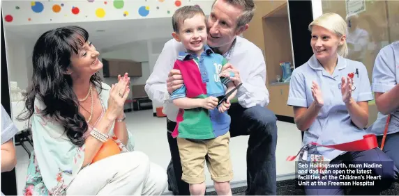  ??  ?? Seb Hollingswo­rth, mum Nadine and dad Ivan open the latest facilities at the Children’s Heart Unit at the Freeman Hospital