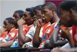  ??  ?? Michael Thomas’ camp delves into more than honing athletes’ skills. Campers learn how to take tests, fill out college applicatio­ns and search for scholarshi­ps.