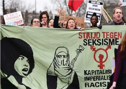  ?? AFP PIC ?? People taking part in an anti-racism demonstrat­ion in Amsterdam, the Netherland­s, on Sunday.