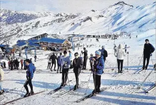  ?? PHOTO: LAKES DISTRICT MUSEUM ?? Fashion forward . . . Skiers pose for a picture at Coronet Peak in the 1970s.