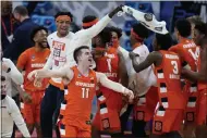  ?? DARRON CUMMINGS — THE ASSOCIATED PRESS ?? Syracuse’s Joseph Girard III celebrates following a second-round game against West Virginia at Bankers Life Fieldhouse on March 21 in Indianapol­is.