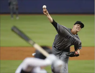  ?? Wilfredo Lee The Associated Press ?? Getting ace right-hander Zack Greinke from the Diamondbac­ks gives the Astros one of the game’s most dominant rotations.