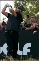  ?? MATTHEW LEWIS/GETTY IMAGES ?? Phil Mickelson tees off on the 16th hole during the final round of the LIV Golf Invitation­al at The Centurion Club on June 11 in St. Albans, England.