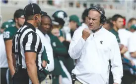  ?? GETTY IMAGES ?? Coach Mark Dantonio saw Michigan State lose at home last week to Northweste­rn. The assignment gets tougher Saturday, when his Spartans travel to Penn State.