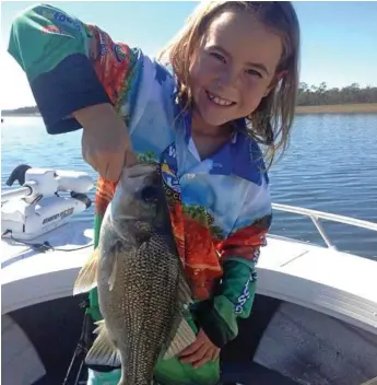  ?? Photo: Mick Johnson ?? NICE FISH: Rylan Johnson shows off his Lake Boondooma catch.