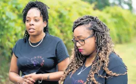  ?? KYLE TELECHAN/POST-TRIBUNE ?? Donyetta Washington and her sister DaNetra helped launch a foundation to support victims of domestic violence after their mother, Mary Washington­Jones, was killed by her partner in a murder-suicide in February.