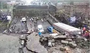  ?? AP IMAGE ?? This screen grab made from video provided by an eyewitness shows a highway overpass that collapsed in Kolkata, India, on Tuesday.