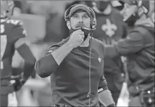  ??  ?? Staying with the Saints: In this Nov. 22, 2020, file photo, New Orleans Saints defensive line coach Ryan Nielsen looks on during an NFL football game against the Atlanta Falcons in New Orleans.