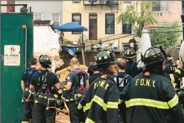  ?? ?? Firefighte­rs try to rescue constructi­on worker from a wall collapse in Sunset Park, Brooklyn, Sept. 12, 2018. Court on Friday found the owner of the constructi­on company guilty of criminally negligent homicide.