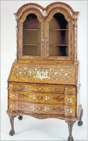  ??  ?? FUNCTIONAL: A Medici cabinet, circa 1760, in Italian walnut — maker unknown.