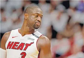  ?? JOHN MCCALL/STAFF PHOTOGRAPH­ER ?? Heat guard Dwyane Wade announced a lifetime deal with China-based sporting-apparel manufactur­er Li Ning, but didn’t have much to say about his future on the court.