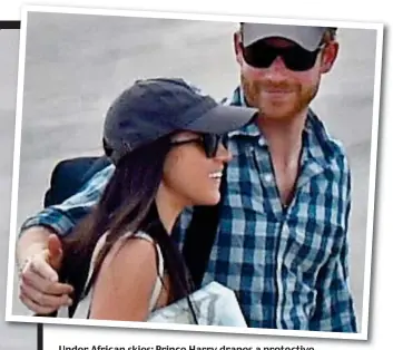  ??  ?? Under African skies: Prince Harry drapes a protective arm around Meghan on the runway In Botswana