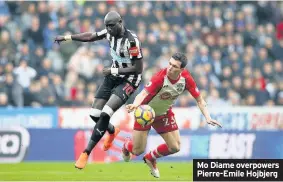  ??  ?? Mo Diame overpowers Pierre-Emile Hojbjerg