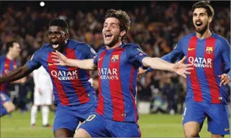  ??  ?? Sergi Roberto (centre) celebratin­g his winning goal for Barcelona with team mates… last night