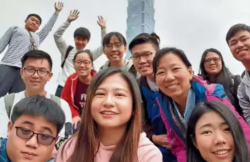  ??  ?? One for the album as the INTI students mark their visit with an iconic shot of Taipei 101.