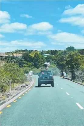  ?? Photo / Supplied ?? An Auckland family was stunned to see a man standing on top of a car as it travelled towards Whanga¯ rei.