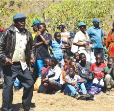  ??  ?? A retired member of the Zimbabwe National Army and war veteran popularly known as Wake (left) displays his dancing skills during last year's Heroes Day commemorat­ions at the Manicaland Provincial Heroes' Acre