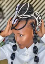  ?? ?? TWICE AS NICE: Also acts as a protective hairstyle with a statement!