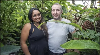  ??  ?? Tropical paradise: Mr Stephenson and his fiancée Asha Ramlal can enjoy walks in the greenhouse