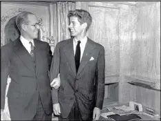  ??  ?? A young John F. Kennedy (right) stands with his father, Joseph P. Kennedy, then U.S. ambassador to Great Britain, in New York on Jan. 5, 1938. Newly found audio of John Kennedy was recorded in 1937.