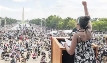  ?? JONATHAN ERNST/AP ?? Yolanda Renee King, granddaugh­ter of the Rev. Martin Luther King Jr., raises her fist as she speaks during the March on Washington on Friday in Washington on the 57th anniversar­y of the civil rights leader’s “I Have A Dream” speech.