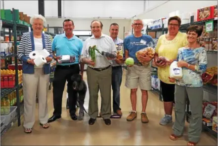  ?? SUBMITTED PHOTO ?? State Sen. Andy Dinniman, D-19, meets with volunteers and members of the West Chester Food Cupboard’s Board of Directors at the cupboard’s new location on Bolmar Street in West Chester. Pictured, from left to right are: Fiona Allison, WCFC secretary;...