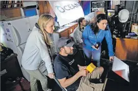  ?? Misael Virgen San Diego Union-Tribune ?? O C E A NA advisor Alexandra Cousteau, left, California program director Geoff Shester and communicat­ions manager Ashley Blacow aboard the Shearwater.