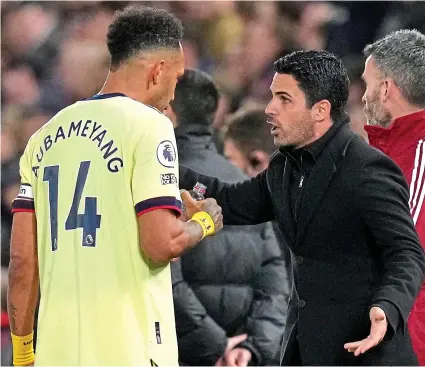  ?? PA ?? Captain chaos: Aubameyang (left) has an uncertain future under Arteta after their falling out