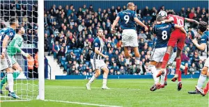  ??  ?? Late rally: Tammy Abraham heads home Swansea’s equaliser with 15 minutes to go after it had looked as if West Brom would end their barren run with a muchneeded victory