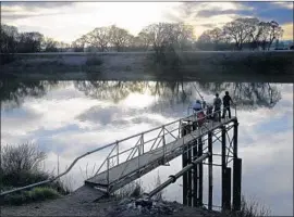  ?? Rich Pedroncell­i Associated Press ?? SOME gubernator­ial hopefuls want the state to explore more options for water conveyance before building twin tunnels. Above, anglers on the Sacramento River.