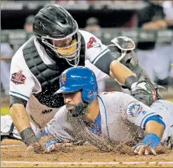  ?? AP ?? AMAZIN’ THEY NEVER LEARN: After releasing a past-his-prime Adrian Gonzalez, the Mets have brought on Jose Bautista, getting tagged out at the plate Friday, under similar circumstan­ces.