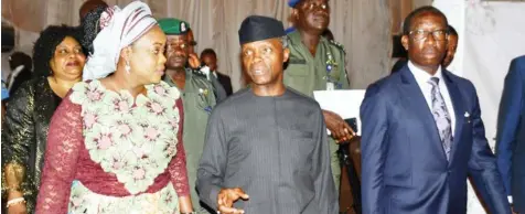  ?? Photo: NAN ?? From left: President Guild of Editors, Mrs Funke Egbemode; Vice President Yemi Osinbajo and Gov Ifeanyi Okowa of Delta State, arrive for the opening ceremony of the 14th All Nigeria Editors Conference in Asaba yesterday