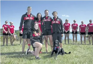  ?? CRAIG GLOVER/POSTMEDIA NETWORK ?? Canadian Paralympic para-rowers Kristen Kit, front, Curtis Halladay, Andrew Todd, Meghan Montgomery and Victoria Nolan, with her guide dog Alan, are introduced to members of the media at the Doug Wells Rowing Centre at Fanshawe Lake in London. Members...