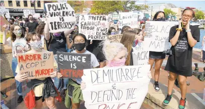  ?? PAUL W. GILLESPIE/CAPITAL GAZETTE ?? Rally co-organizer Micah Stevens, 16, a rising senior at Annapolis High School, gets the group going at a Black Lives Matter demonstrat­ion in June by chanting names of Black people killed by police over the years.