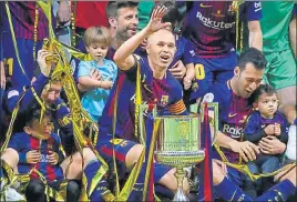  ?? REUTERS ?? Andres Iniesta (centre) was understand­ably tearful after Barcelona’s King’s Cup win.