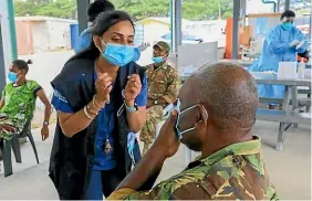  ?? WHO/PNG ?? Medical staff of Papua New Guinea’s Defence Force are trained to deal with the nation’s Covid-19 outbreak.