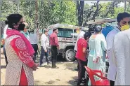  ?? HT PHOTO ?? People wait to be tested in Dehradun.