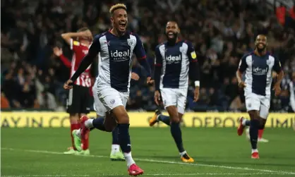  ?? Albion FC/Getty Images ?? Callum Robinson (left) after scoring West Brom’s fourth goal against Sheffield United. Photograph: Adam Fradgley/AMA/West Bromwich